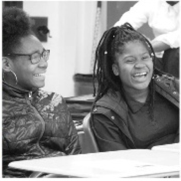 Two girls laughing